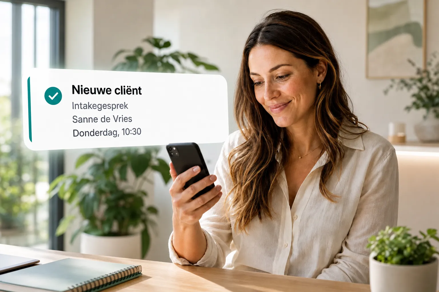 A health professional getting a new client booking notification through Vitena