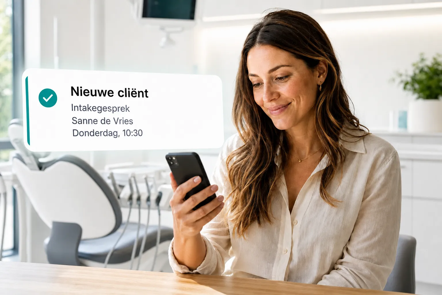 A health professional getting a new client booking notification through Vitena